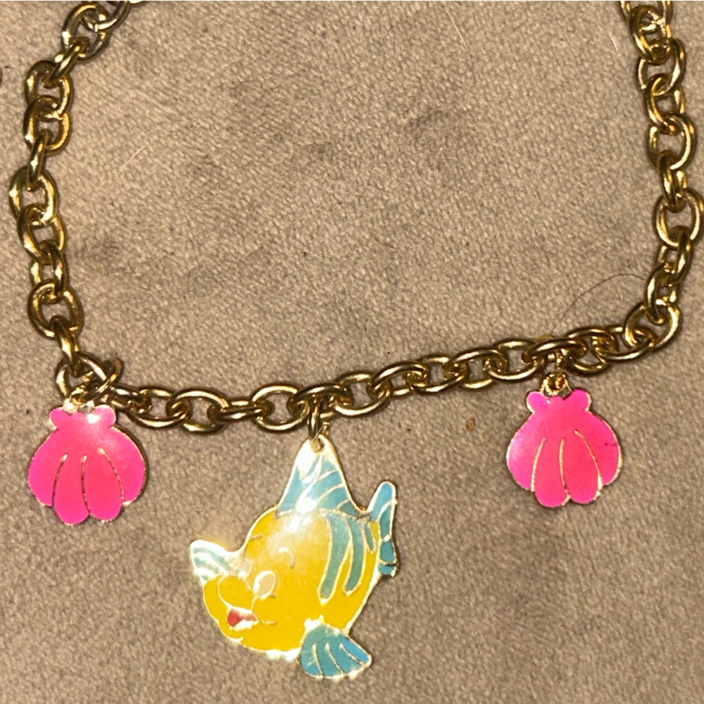 Disney Gold-Tone Charm Bracelet with Yellow & Blue Flounder and Pink Shells